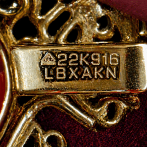 Gold badge with engraved details